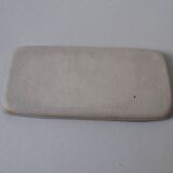 Sandstone cake dish with a fish decoration