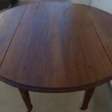Antique round table with shutters in walnut wood on casters