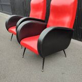 Pair of red and black faux leather armchairs
