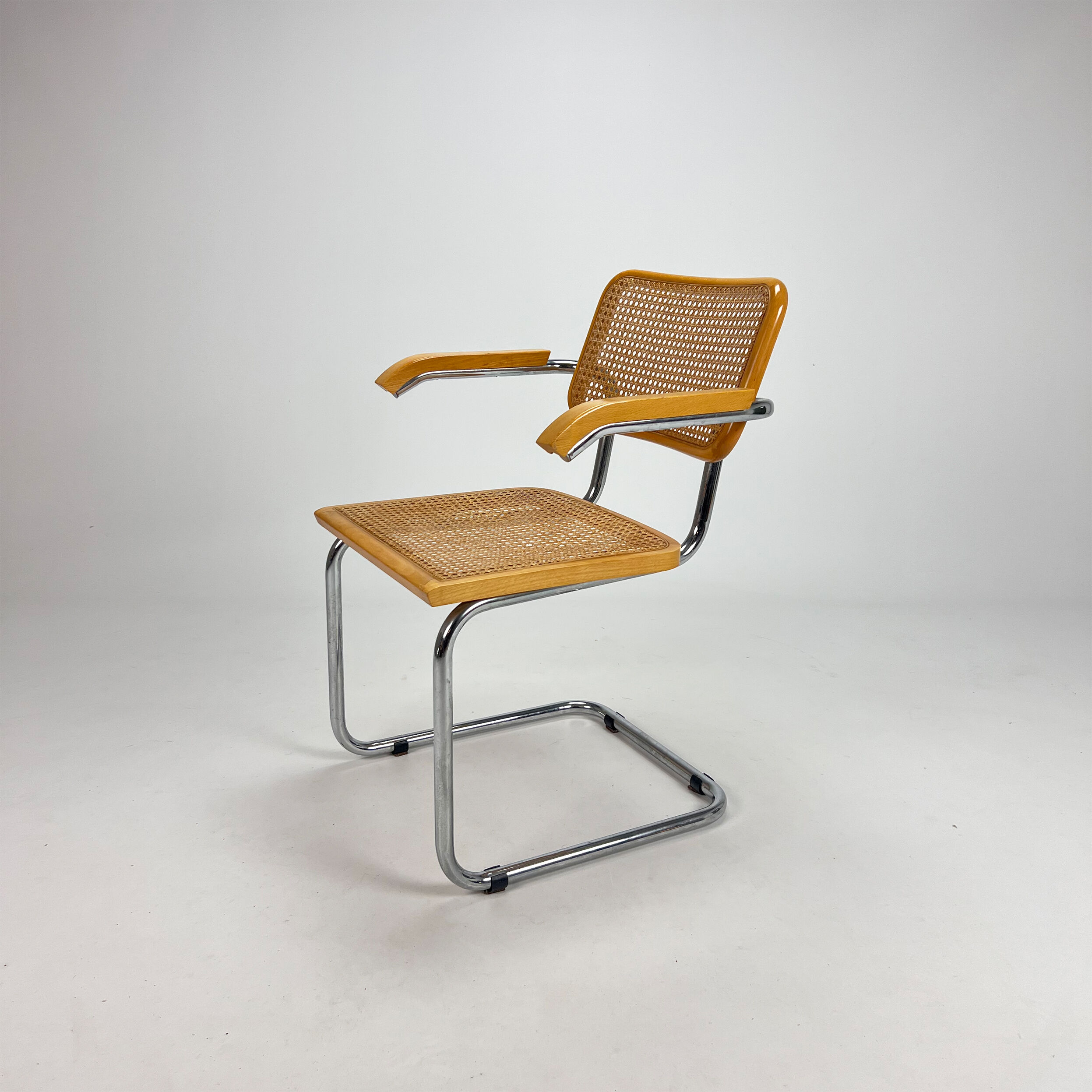 Tubular frame and cane cantilever dining chair, italy, 1970s