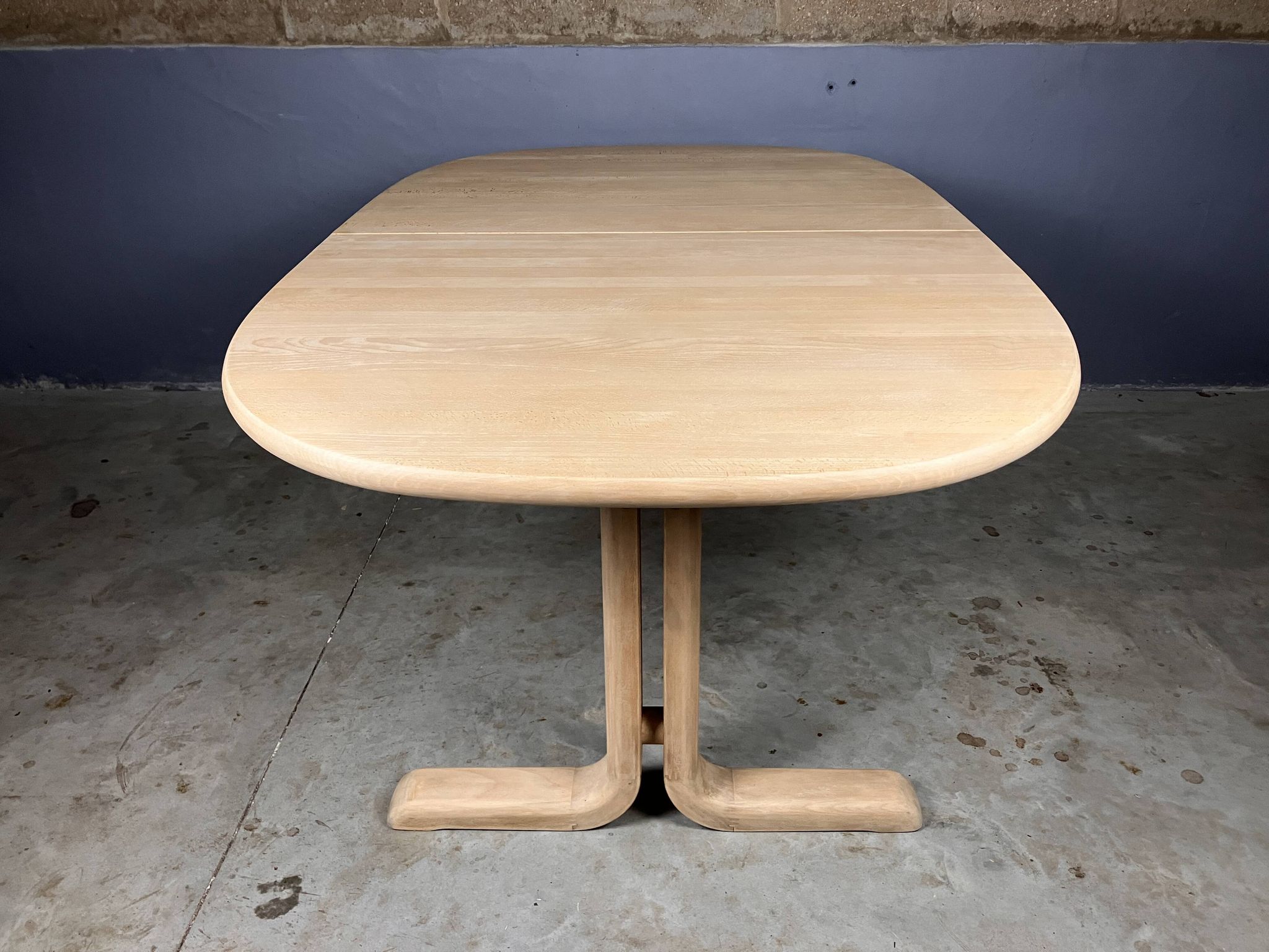Oval extendable dining table in beech with Danish design.