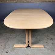Oval extendable dining table in beech with Danish design.