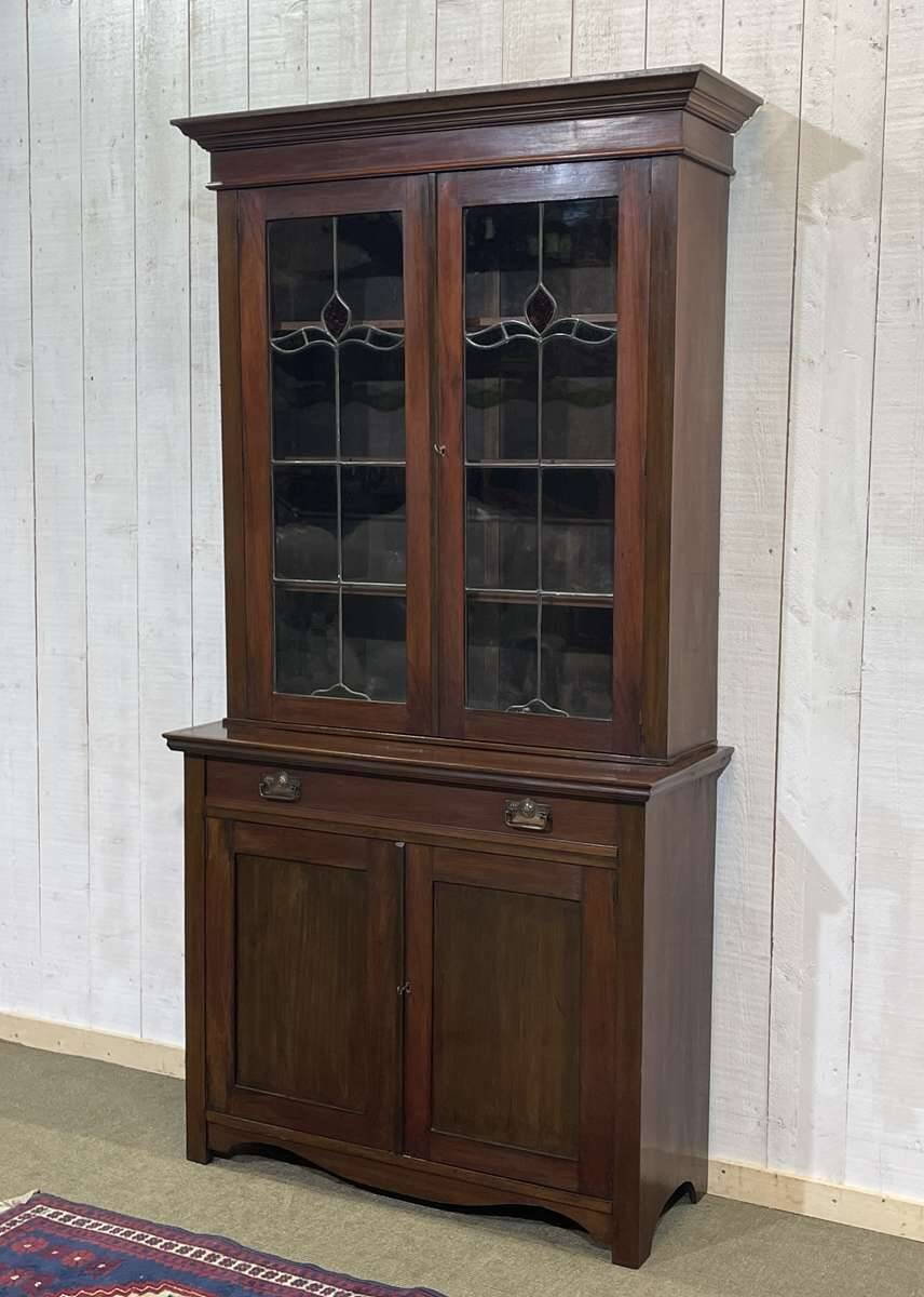 Early 20th century English two-section mahogany bookcase