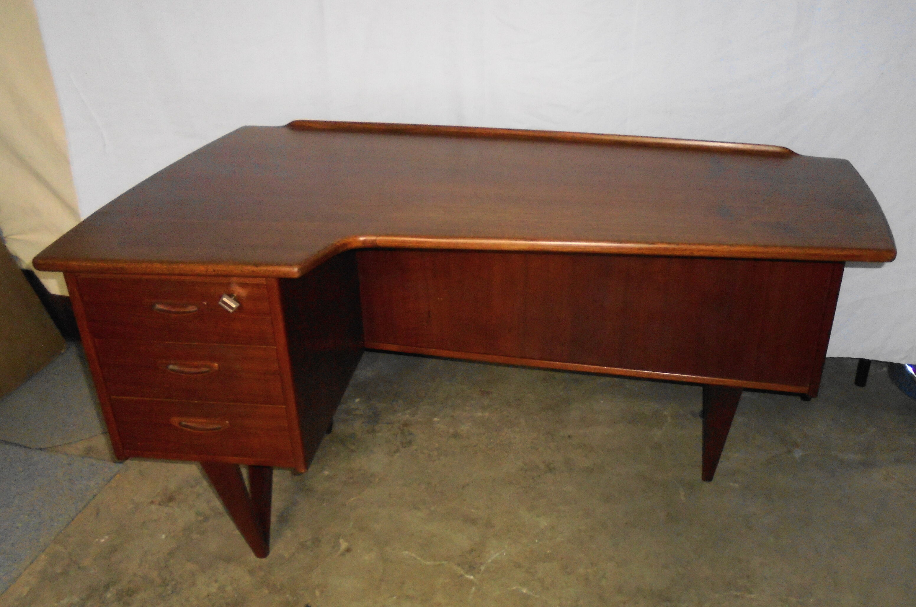 Peter Lovig Nielsen's Scandinavian teak boomerang desk from the 60s