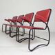 Set of 4 armchairs and a coffee table with tubular structure in Bauhaus style, 1950s.