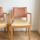 Set of 6 vintage Scandinavian chairs in wood and faux leather.