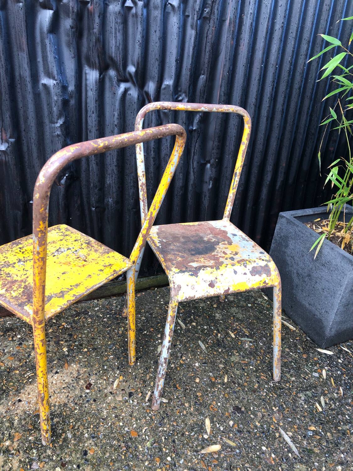 Pair of metal chairs