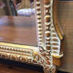 Miroir doré de style Louis XVI