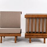 Pair of low chairs called La cachette selected by Charlotte Perriand