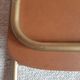 Chaise pliante structure tube et simili cuir