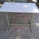 Old garden table with iron slats