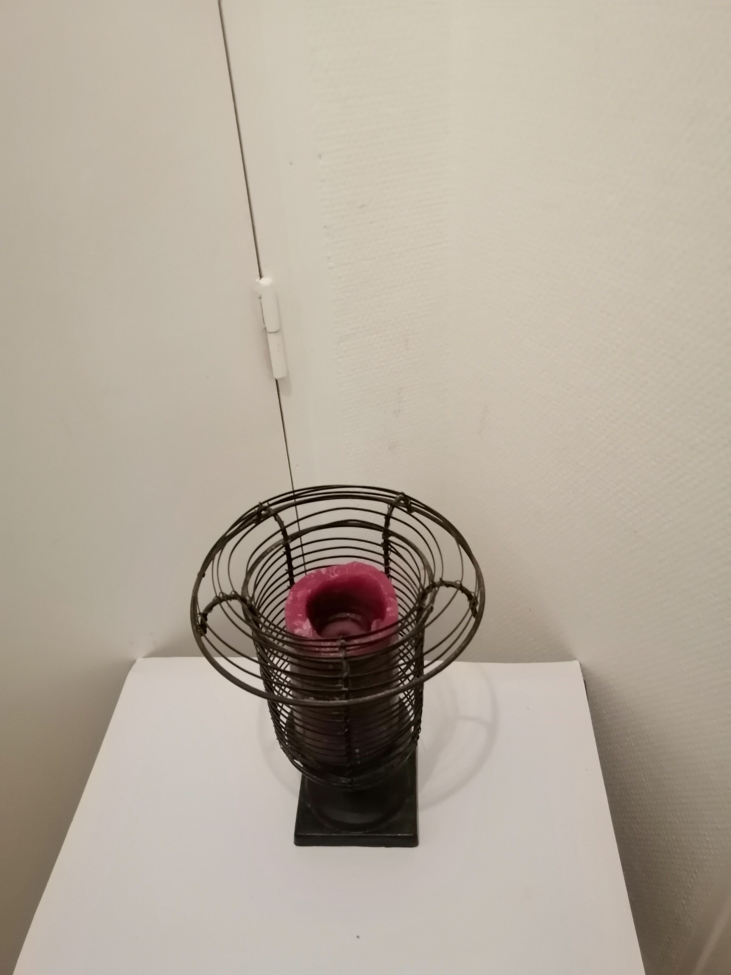 Wrought iron candle holder