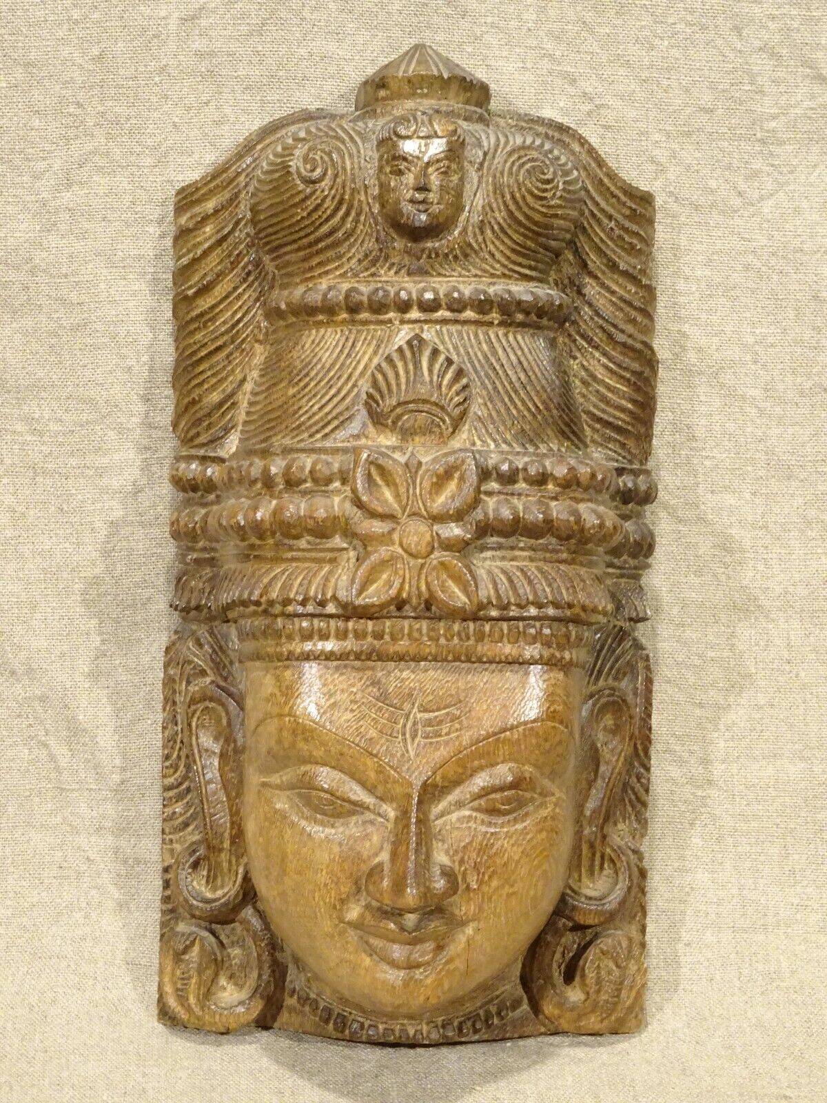 Hindu Shiva mask head wooden sculpture?