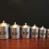 Six aluminum spice pots