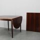 1960s Danish extendable palisander dining table, 4 leaves, restored