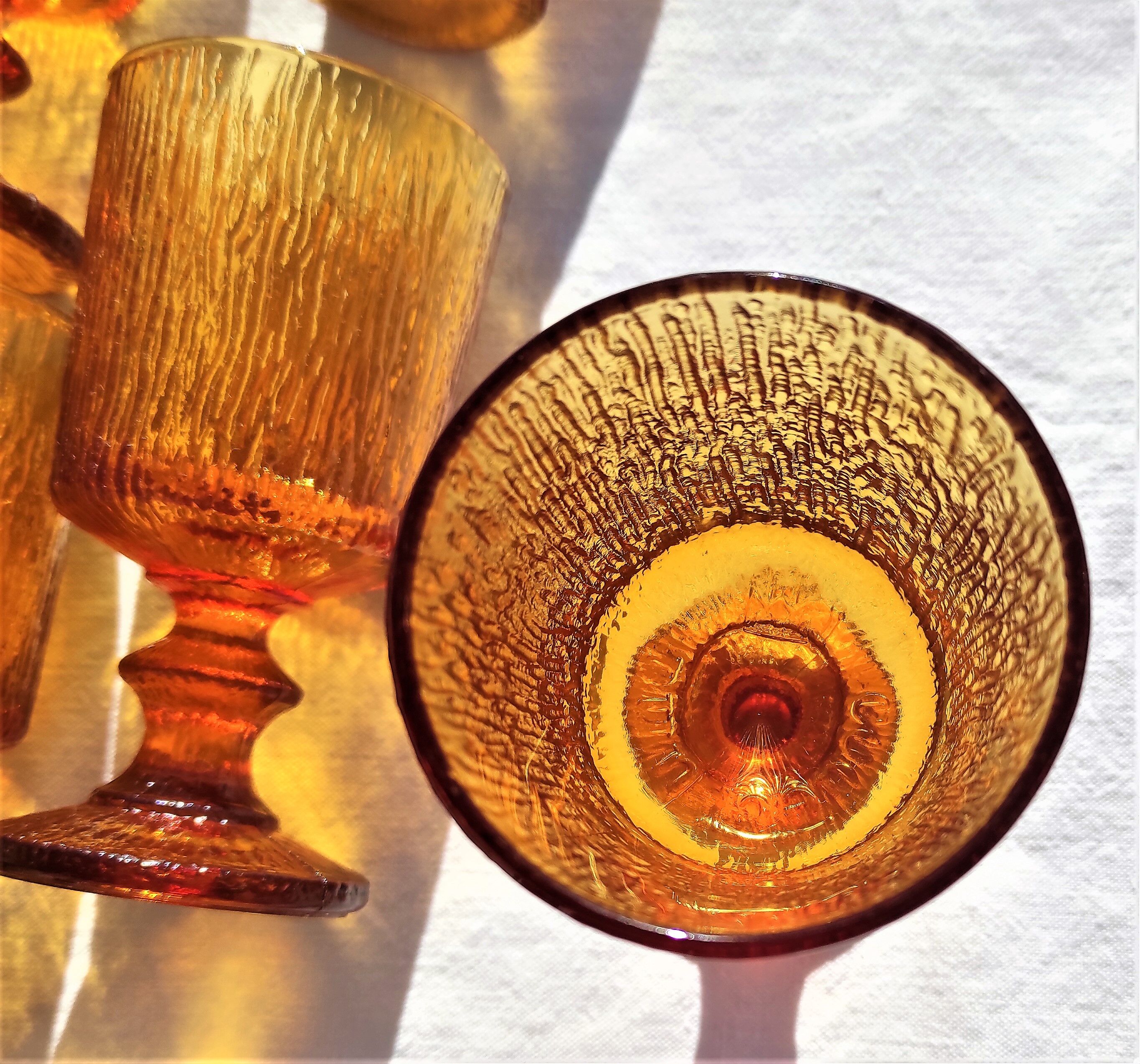 9 orange-stemmed wine glasses circa 1970