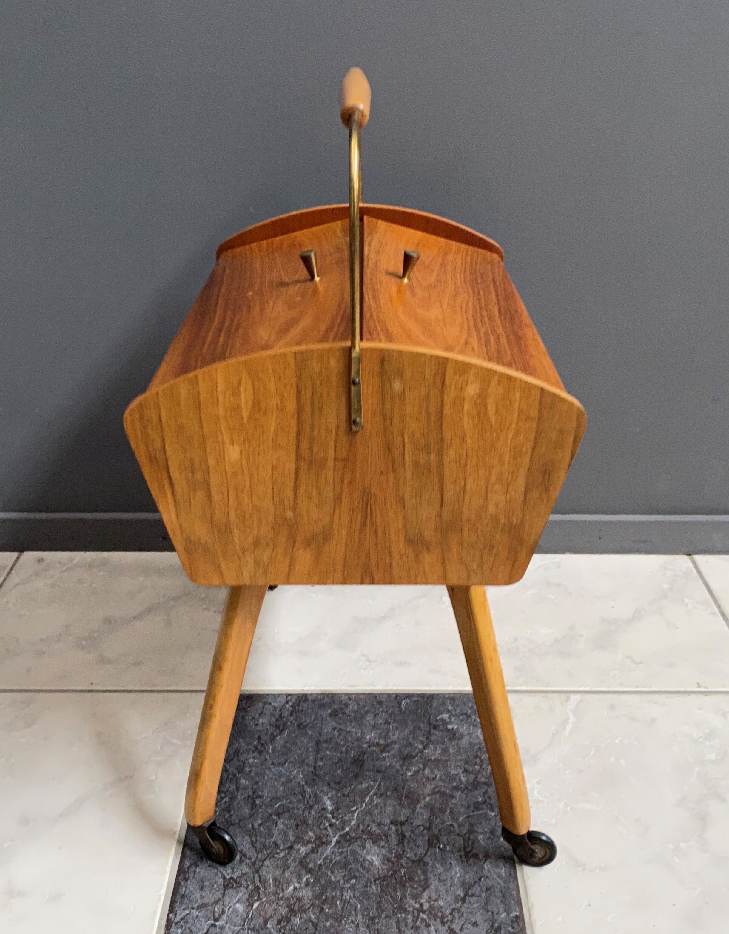 Sewing box on legs and wheels