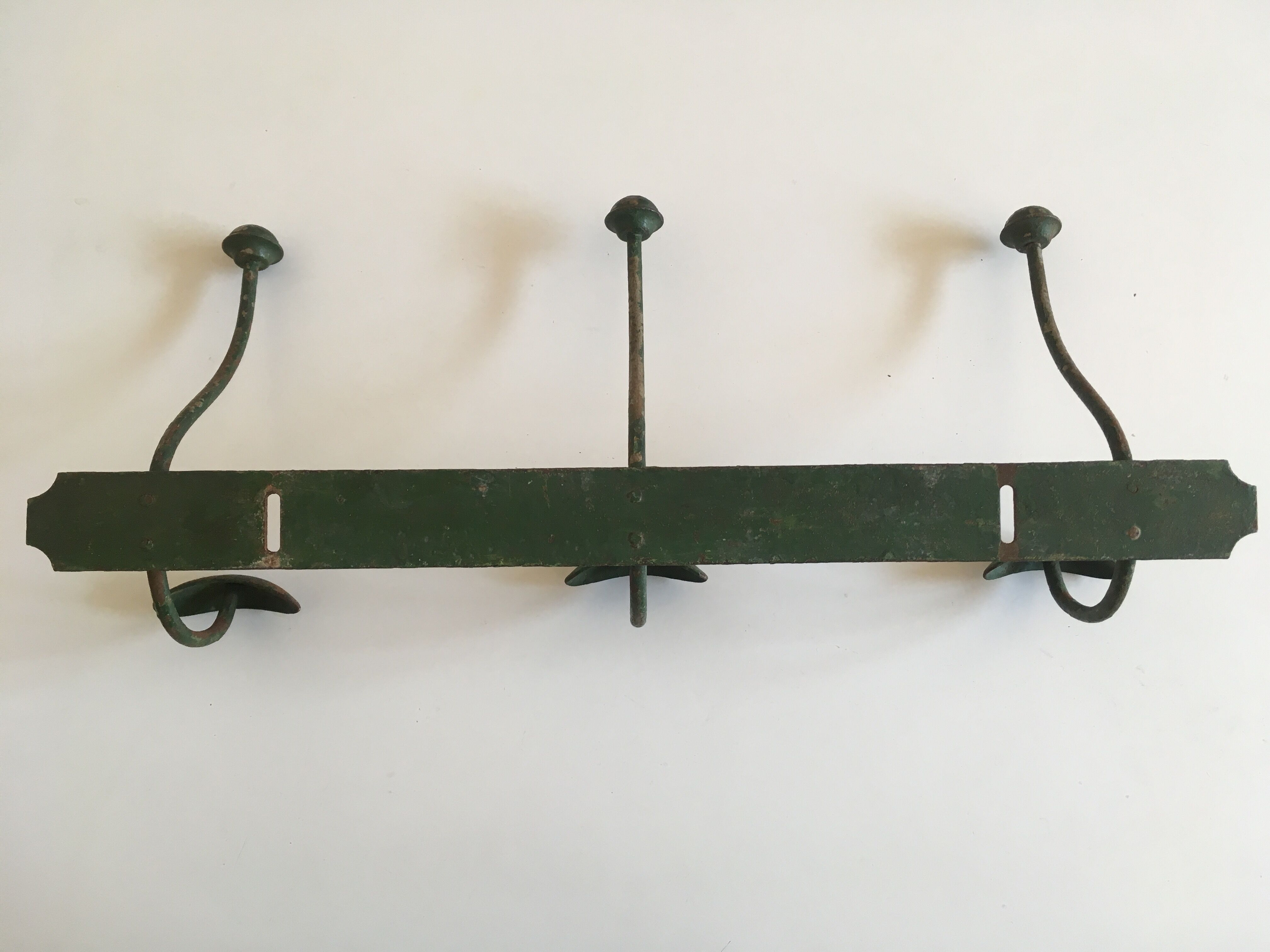 1900 green metal garden coat holder