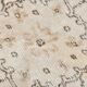 Rare tapis vintage fait main tons rose poudré et beige, motifs floraux