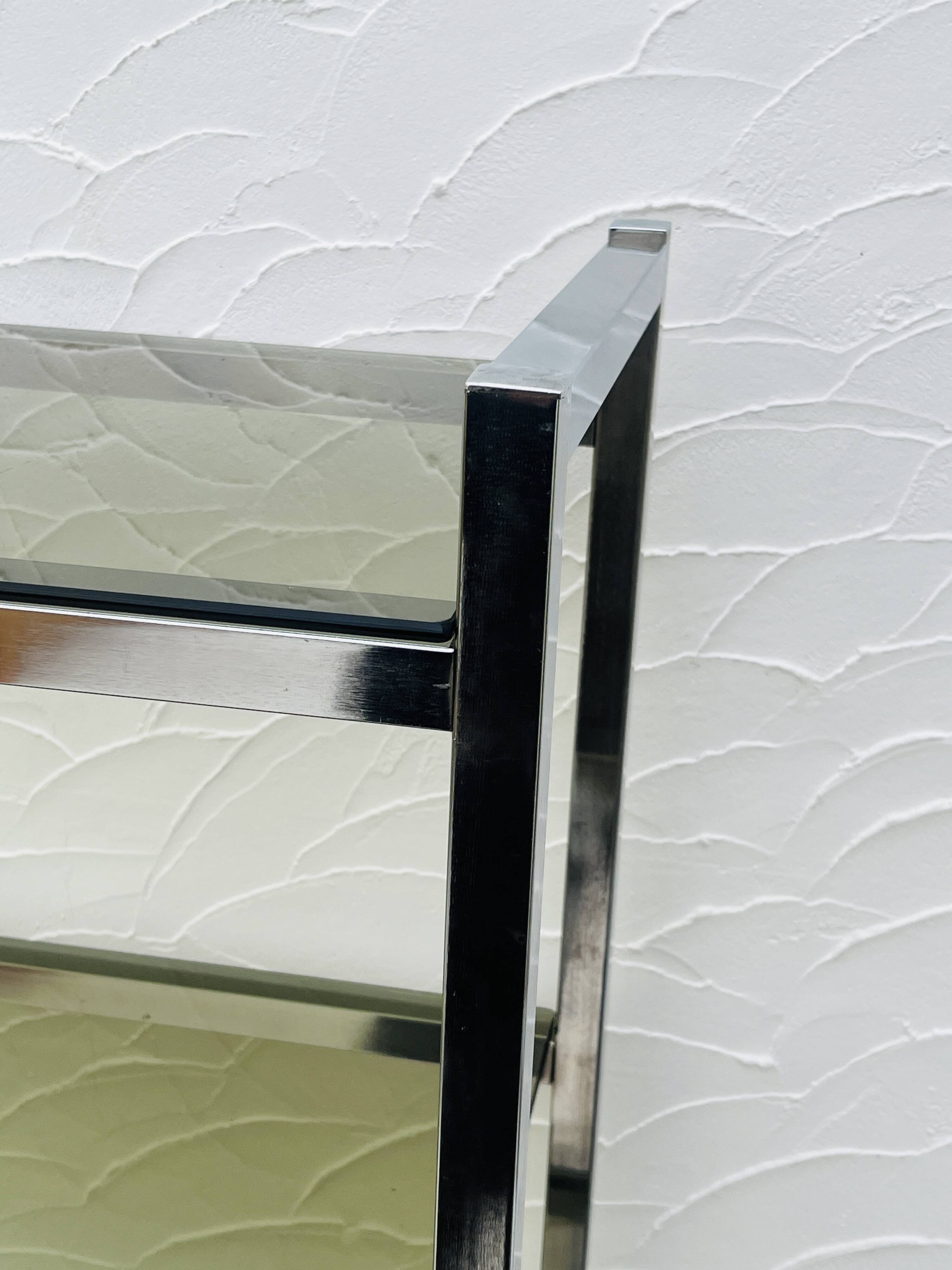 Vintage Italian design shelf in chrome and smoked glass from the 1970s.