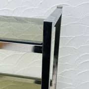 Vintage Italian design shelf in chrome and smoked glass from the 1970s.