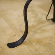 Wrought iron floor lamp in the style of the Marolles workshops from the 1950s.