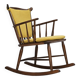 Années 1960-70, design danois par Farstrup Stolefabrik, rocking chair retapissé.