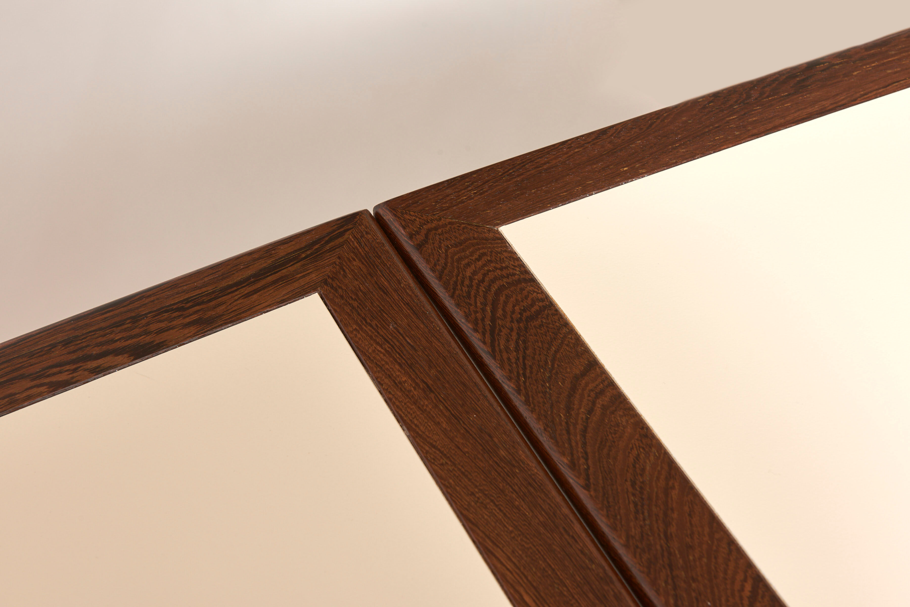 Brutalist conference table made of wood and steel