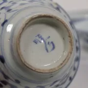 Set of 4 Chinese blue and white bowls with lotus scrolls – 19th century