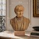 Bust of a notable in terracotta, 29 cm, signed Pasquet, 1870, on a base.