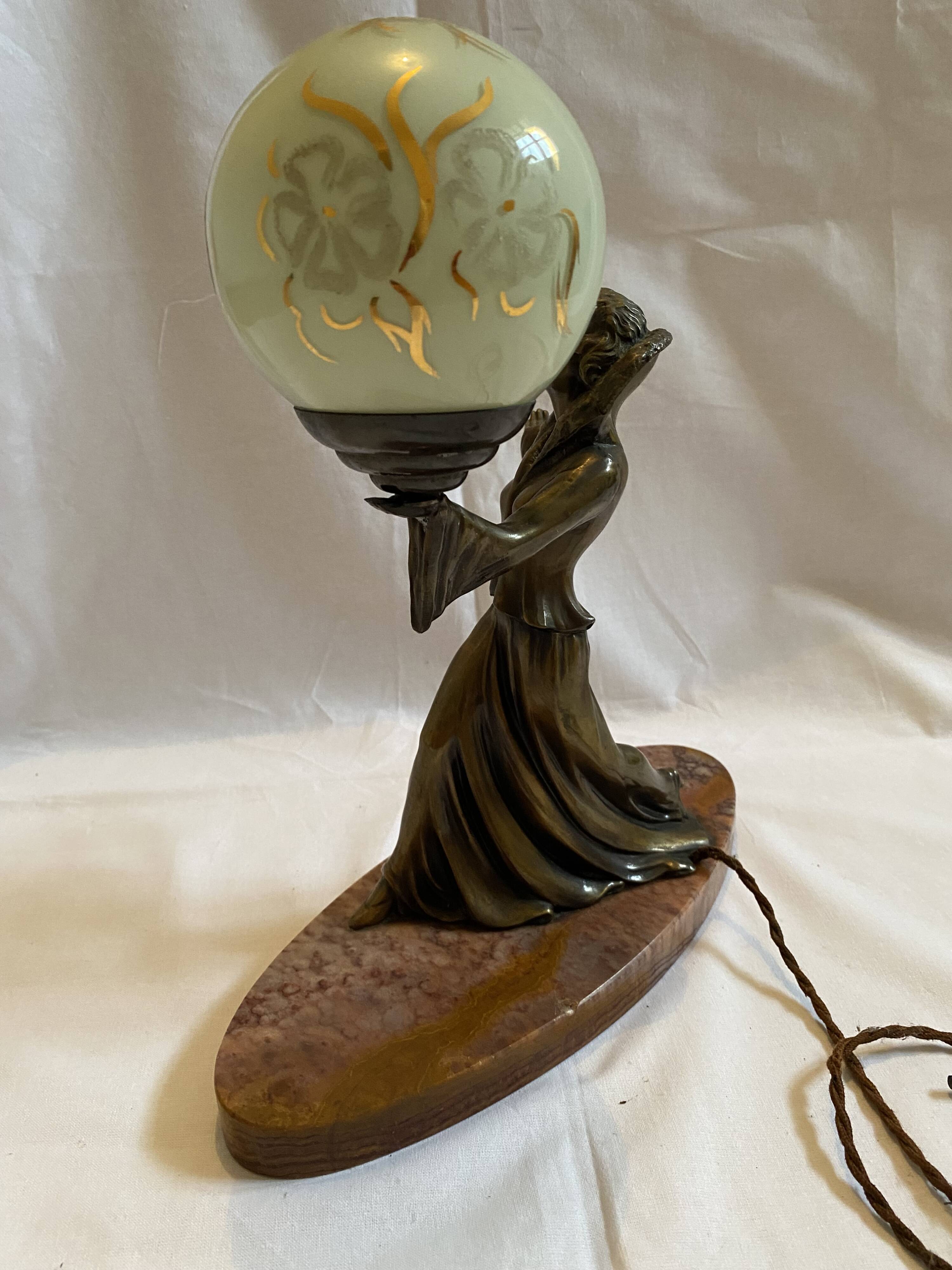 Art deco lamp in marble and bronze, woman holding a globe