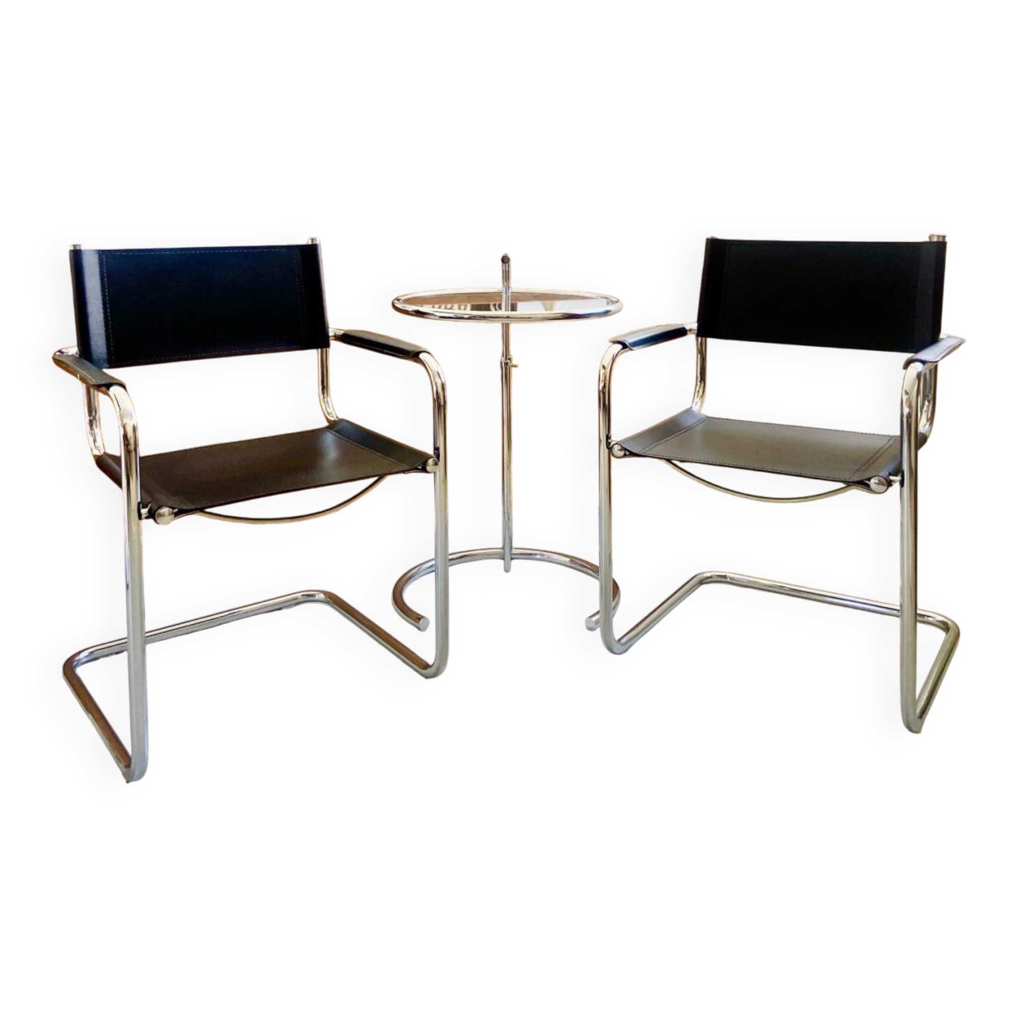 Pair of vintage chrome and black faux leather armchairs