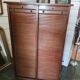 Double curtain binder in blond mahogany