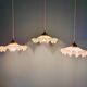 Art Deco trio of suspensions in coloured frilled opaline, 1920-30.