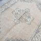 Small bige vintage floral rug