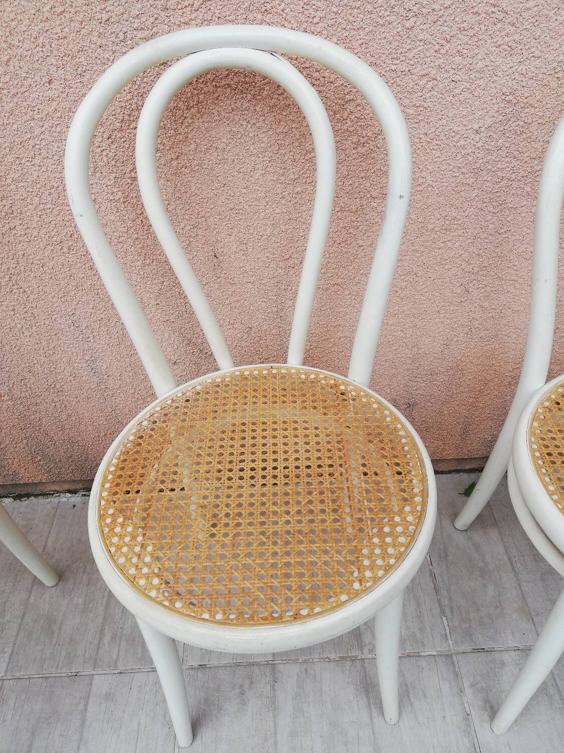 Lot of three Vintage ecru natural cane bistro chairs