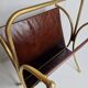 Vintage magazines and gold and leather brass