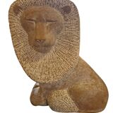 Sculpture of a lion in stone by Islay Grimes.