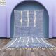 Handwoven Berber rug in blue and white, size 150x250 cm.