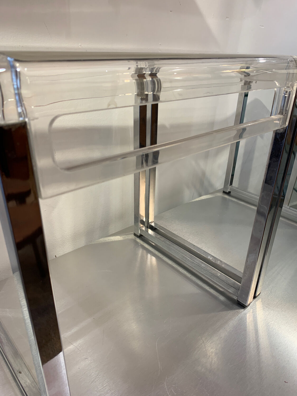 Pair of vintage chrome and acrylic glass bedside tables