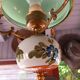 Old green opaline chandelier, gold metal and earthenware