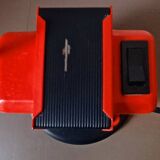 Daphine red desk lamp published by Lumina. T. Cimini.