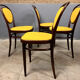 Thonet 215 en bois courbé jaune, récemment retapissé