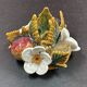 Candlestick with flowers and fruits in slip, Malicorne ceramic