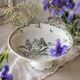 Plate on pedestal Iris Creil Montereau Terre de Fer from the 1900s