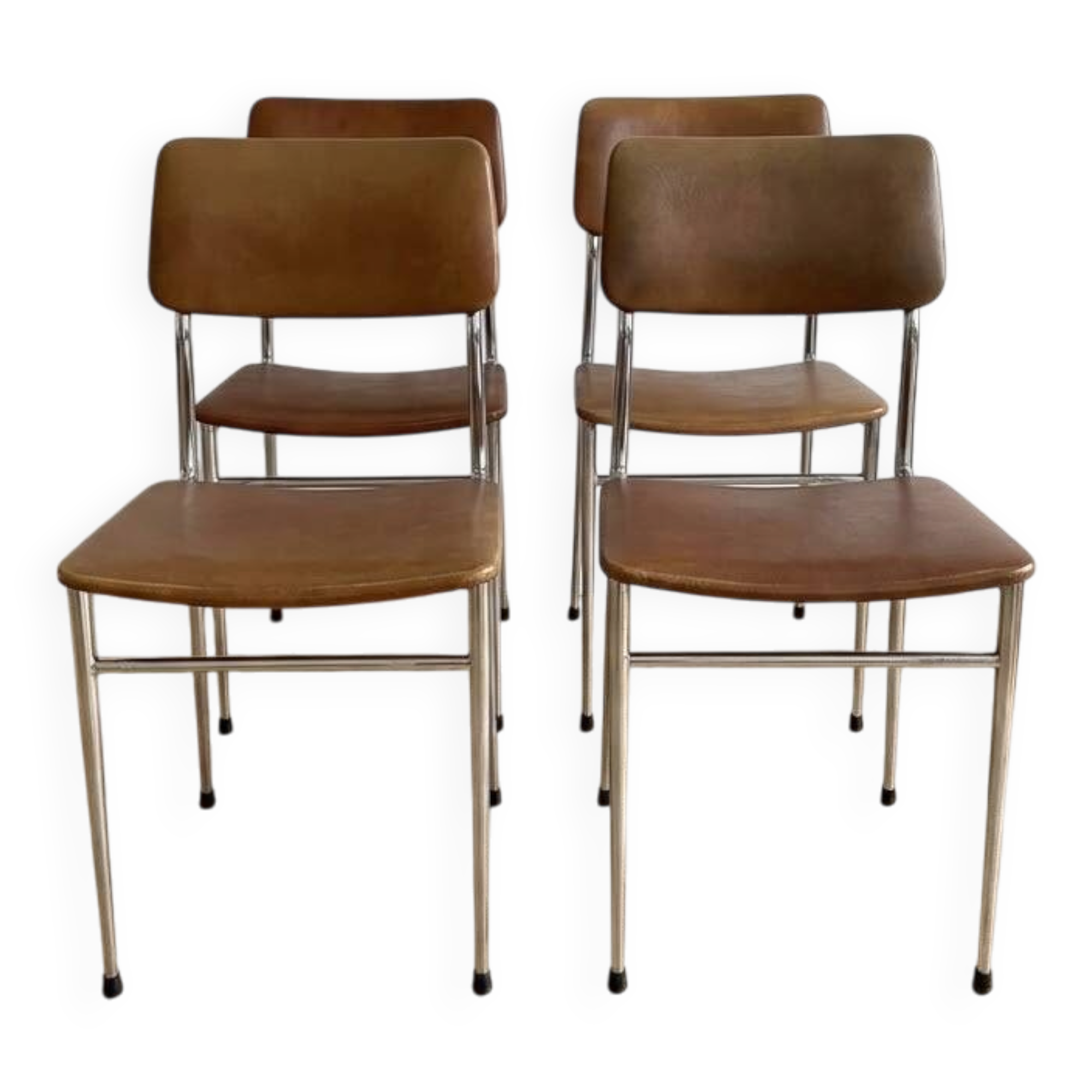 Set of 4 vintage 1970s brown faux leather chairs.
