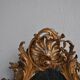 Miroir en stuc doré rocaille époque XIXème 110cm