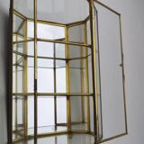 Vintage showcase in brass, glass and mirrors