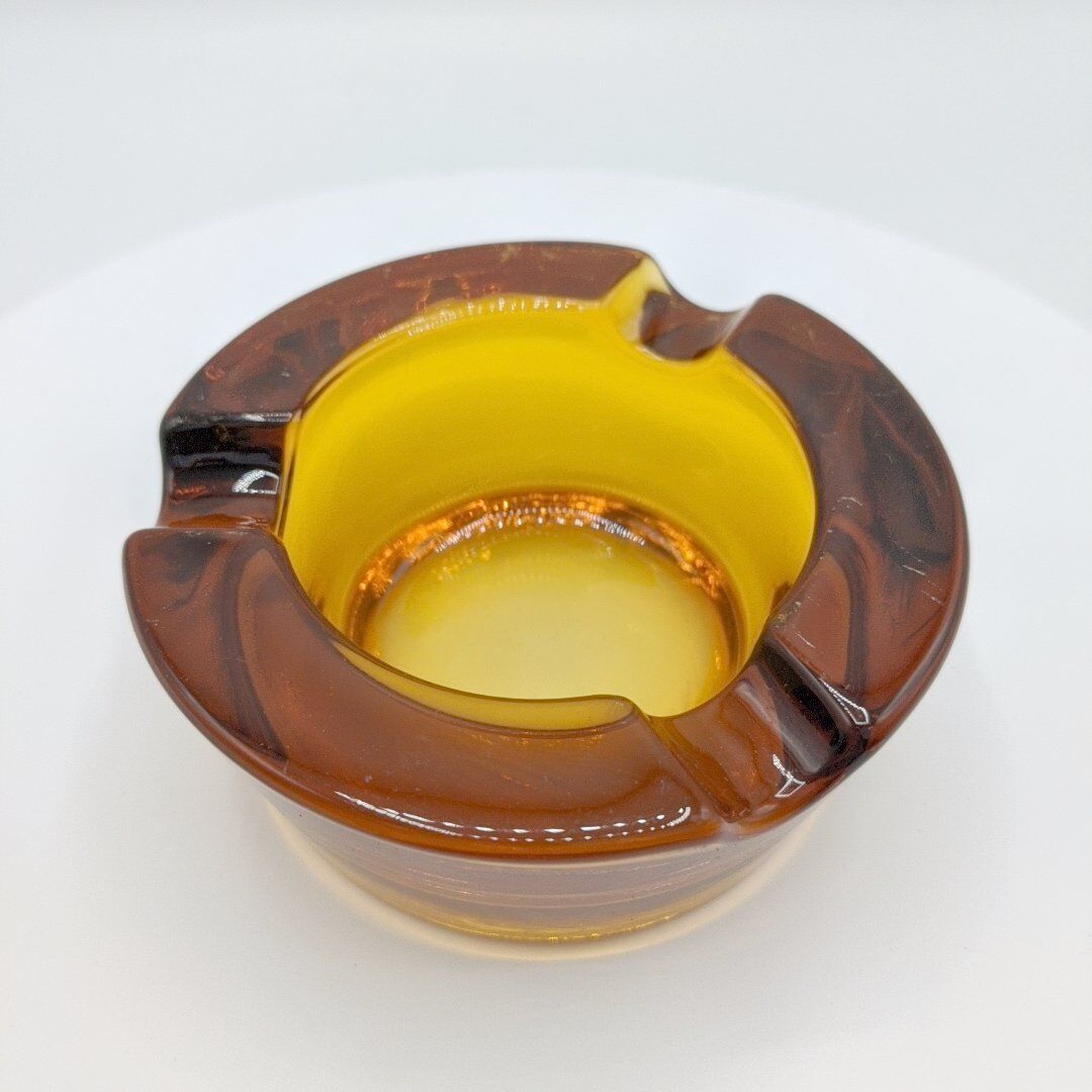 Amber glass ashtray 70s