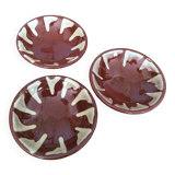 3 glazed terracotta plates